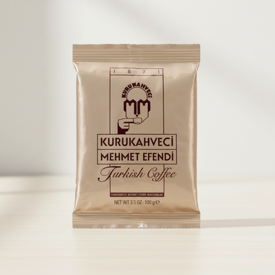 Kurukahveci Mehmet Efendi turku kafija 100g produkta iepakojums priekšplānā